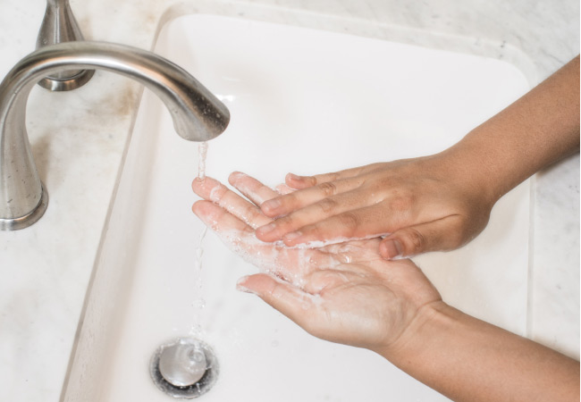 washing hands with soap and water