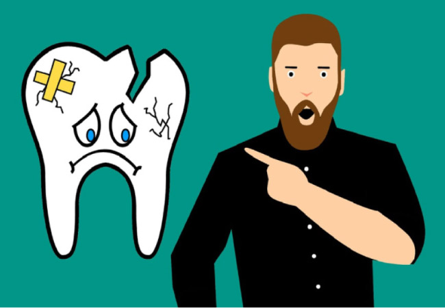 cartoon man points to a frowning, chipped and cracked cartoon tooth